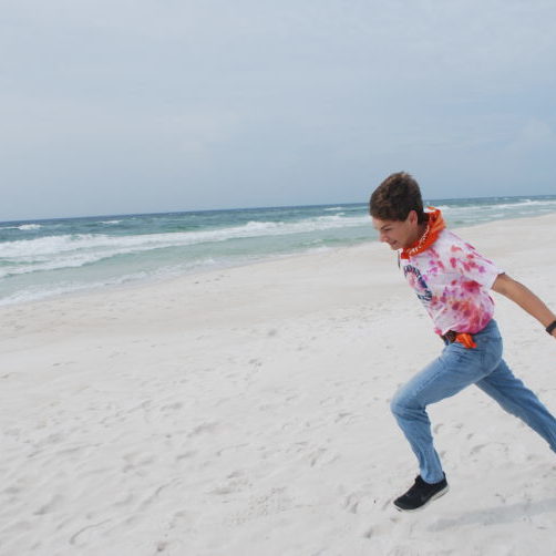 running on the beach | Hybrid Homeschool For Living Science | Living Science Academy